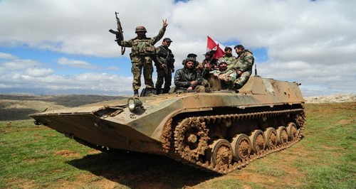 Syrian army tightens siege on rebels near Lebanon border  - ảnh 1